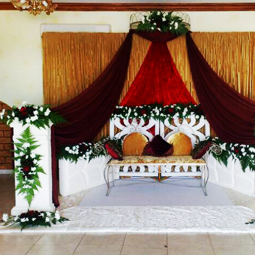 Elegant wedding stage(Gold red and flower theme)