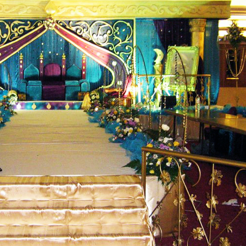 Wedding stage decoration dubai with golden and blue theme by koshaUAE